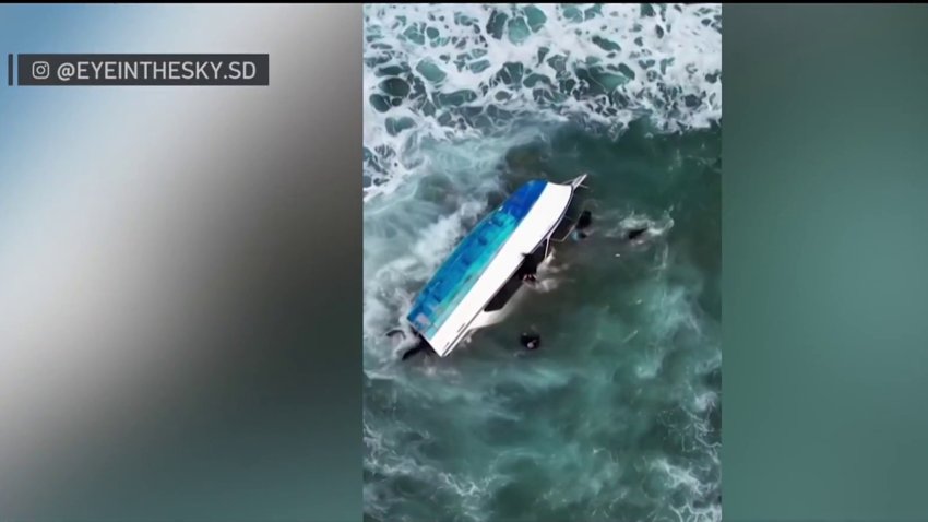 Drone video captured the capsize of a suspected migrant smuggling boat in Ocean Beach.