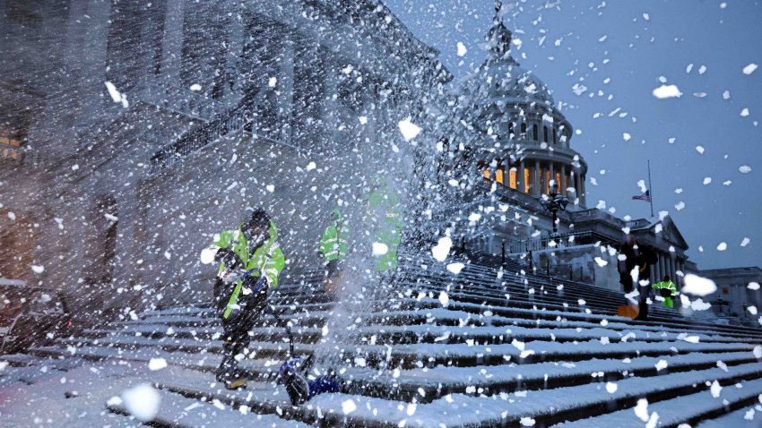 WASHINGTON, DC – JANUARY 06: Crews work before dawn to clear snow from the steps on the East Front of the U.S. Capitol as a winter storm slams into the nation’s capital on January 06, 2025 in Washington, DC. Congress is scheduled to certify the 2024 presidential elections results on Monday, four years after a mob of supporters of then-President Donald Trump stormed the capitol to halt the certification of the 2020 election results. (Photo by Chip Somodevilla/Getty Images)