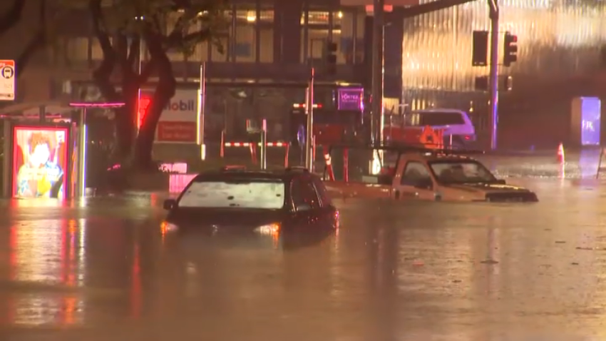 Cars stuck along La Jolla Village Drive in La Jolla during a storm on March 6, 2025.