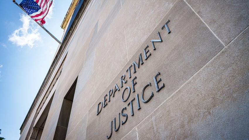 WASHINGTON, DC – SEPTEMBER 15: A U.S. Flag flies on the side of the U.S. Department of Justice (DOJ) headquarters building on September 15, 2024, in Washington, DC. (Photo by J. David Ake/Getty Images)