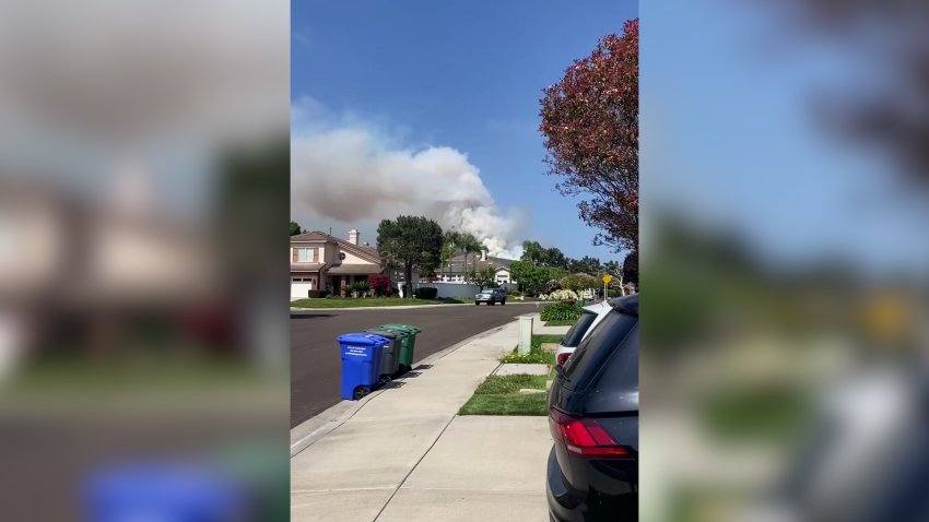 Smoke from a fire burning in Carlsbad on June 12, 2025.