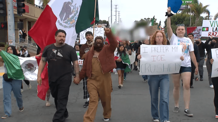 People gathered to protest against ICE in National City on June 11, 2025.