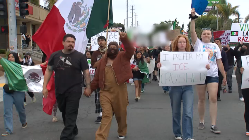 People gathered to protest against ICE in National City on June 11, 2025.