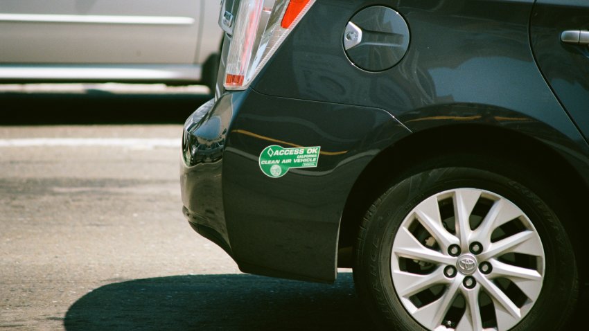 Closeup of Access Ok, California Clean Air Vehicle decal on the bumper of a black Toyota automobile, indicating that the automobile may drive in carpool lanes, Silicon Valley, San Jose, California, August 17, 2017. (Photo via Smith Collection/Gado/Getty Images)