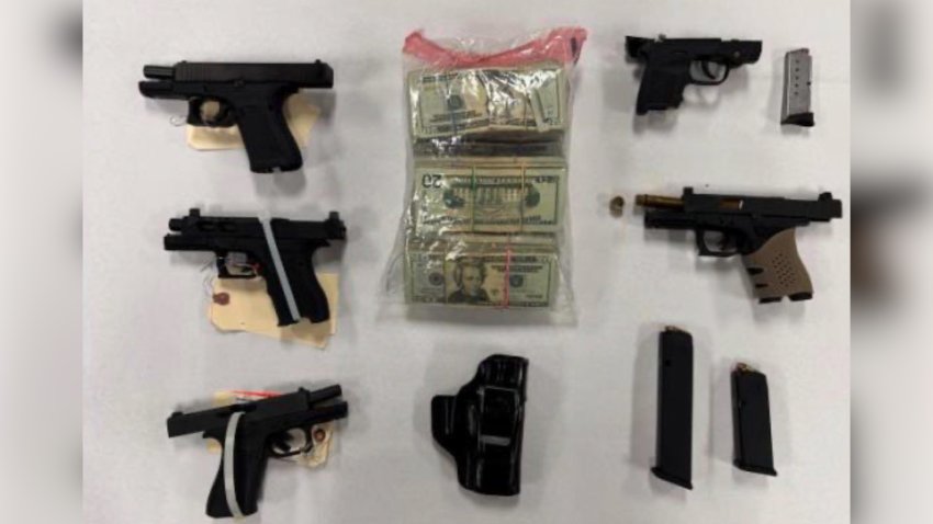 An image of firearms and cash that were recovered during the operation on Tuesday, Feb. 24, 2026.