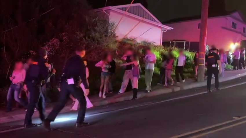 San Diego police officers break up an illegal party at a vacant real estate listing on Valentine's Day.