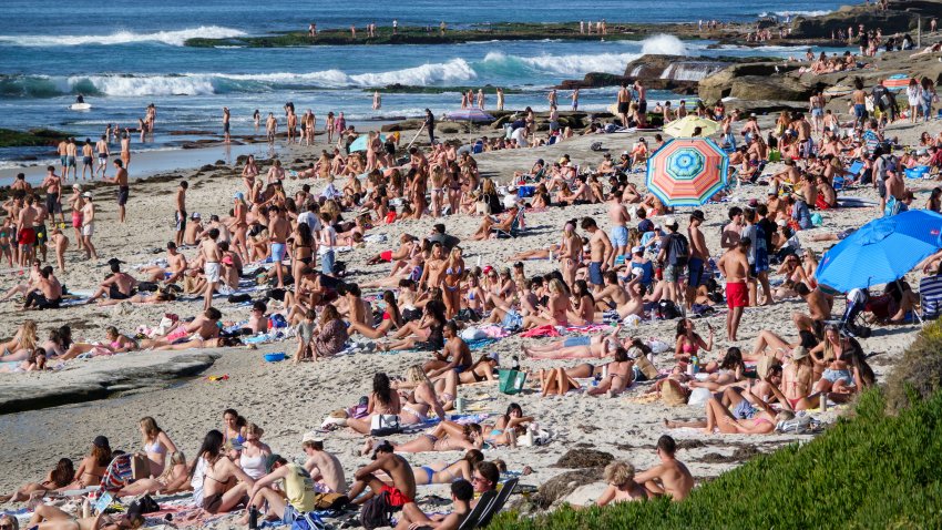 SAN DIEGO, CALIFORNIA – JANUARY 31: Beachgoers pack La Jolla’s Windansea Beach during a winter heat wave on January 31, 2026 in San Diego, CA. (Photo by Kevin Carter/Getty Images)
