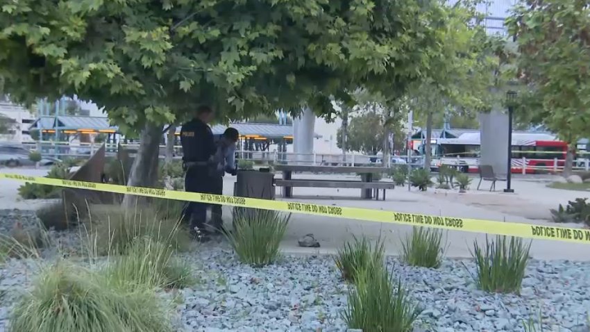 Detectives at the scene of a homicide investigation in Fashion Valley on April 8, 2026.