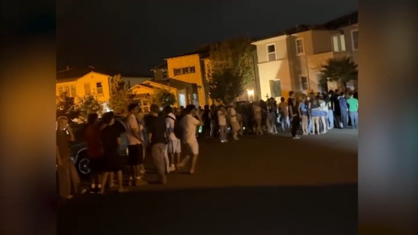 Hundreds of teens crowd the cul-de-sac of a 4S Ranch neighborhood in San Diego on Sept. 6, 2026.