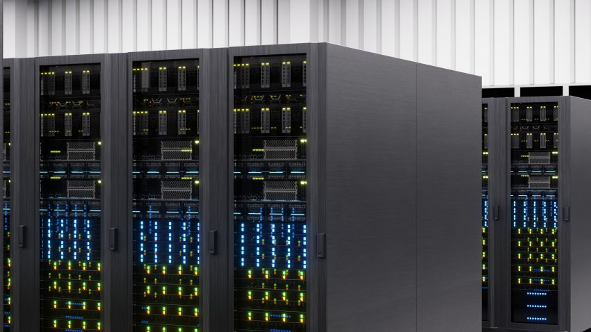 Two rows of large computers sit in a room. September 10, 2026.